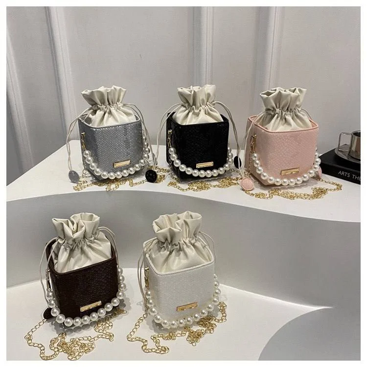 Elegant Pearl-Embellished Bucket Bag with Drawstring Closure