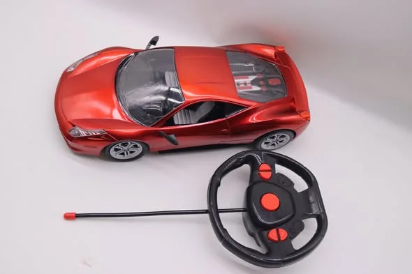 1199.  Rechargeable Remote Control Ferrary car for kids.